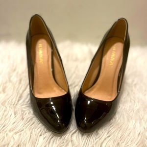 Black shiny patent leather stiletto heel